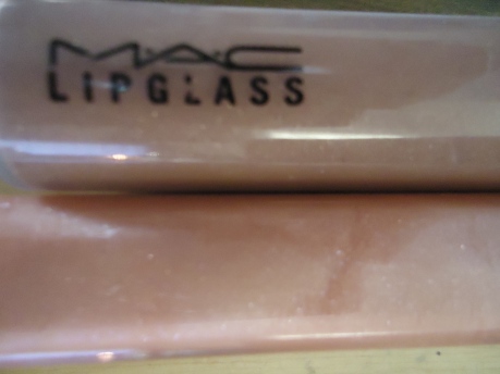Top: Mac's Viva Glam V lipglass, bottom: Maybelline's Born With It lipgloss.