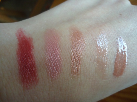 ....and swatches!  Left to right:  L'Oreal's Blushing Berry, Maybelline's Born With It lipstick, Maybelline's Nearly There, Maybelline's Born With It lipgloss, and Mac's Viva Glam V
